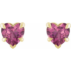 Heart-shaped pink gemstone earrings with gold accents on a white background