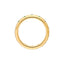A emerald eternity band made in 14k yellow gold with round emeralds set around the ring. 