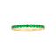 Gold ring with green gemstones on a white background