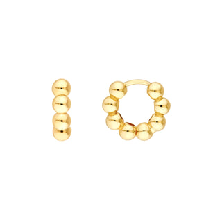 A hinged huggie earrings with a beaded design. Eight round gold beads hugging your ear lobe for a simple yet eye catching look. 