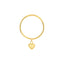 A hear charm dangling from a wire stacking ring
