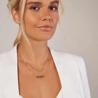 A gothic font nameplate with a paperclip chain finished with lobster clasp. 