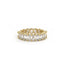 Gold ring with emerald-cut diamonds on a white background