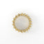 Gold ring with a beige stone on a white background