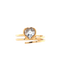 A heart bezel set with a swirl gold band. 