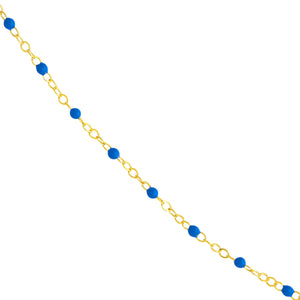 Product picture of an enamel beaded station chain. This chain has a color beaded element spaced with gold cable links. Blue 