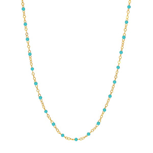 Product picture of an enamel beaded station chain. This chain has a color beaded element spaced with gold cable links. Showing turquoise color.