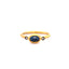 Product picture showing a blue sapphire ring with bezel setting and two diamonds on the sides. This gold ring has a hammered antique look. 