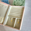A jewelry box that is made like a book. With magnets at the closure, this book shaped jewelry box can be opened to reveal ring slots, necklace storage and bracelets and earrings too. Comes in three different colors and themes. Fortune, rose, and beauty