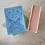 A jewelry box that is made like a book. With magnets at the closure, this book shaped jewelry box can be opened to reveal ring slots, necklace storage and bracelets and earrings too. Comes in three different colors and themes. Fortune, rose, and beauty