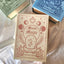 A jewelry box that is made like a book. With magnets at the closure, this book shaped jewelry box can be opened to reveal ring slots, necklace storage and bracelets and earrings too. Comes in three different colors and themes. Fortune, rose, and beauty