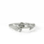 Silver ring with a rose design on a white background