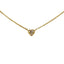 Diamond heart in bezel setting attached to a dainty cable chain.