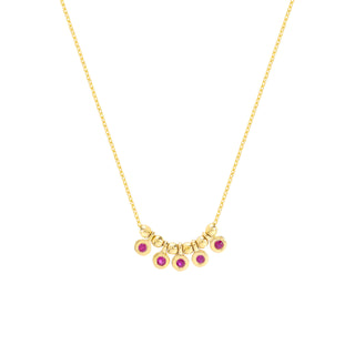 A solid gold bezel set ruby shaker necklace with a cable chain. Made to attract love. Finished with a pear lobster clasp. 