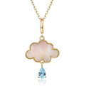 Gold necklace with a cloud-shaped pendant and blue gemstone on a white background