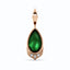 Solid gold green pear shaped tsavorite gemstone pendant with three baguette diamonds set at the bottom.