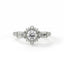 Diamond ring with floral design on a white background