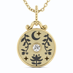 A beautiful coin charm with moon, lotus and flower vine designs, very detailed antique finish. With a round center diamond and carved stars. 