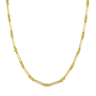 A gold trombone link chain with elongated oval links and three round links alternated finished with a lobster clasp. 