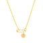 A elongated oval shaped gold connector with a single bezel set diamond . Spring push lock closure. 