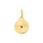 A round pendant with a ray design going toward a center ruby. The ruby is bezel set along with a plain gold boarder.