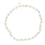 Pearl necklace with gold clasp on a white background