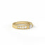 Gold ring with diamonds on a white background