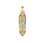 A gold pendant with a moonstone center and crescent on both sides to mimic the phases of the moon. Made with stars and blue palette colored gemstones. 