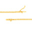 Gold beaded necklace on a white background