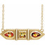 Gold necklace with gemstones on a white background