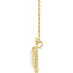 Gold necklace with a pendant on a white background