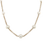 A pearl station necklace with fresh water pearls stationed with rolo link chain segments in between. 