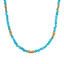 A blue turquoise necklace with turquoise nugget beads and gold nugget bead accents. Finished with lobster clasp. 