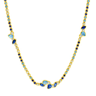 A blue sapphire necklace with pear shaped clusters.
