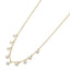 Gold necklace with pearls on a white background