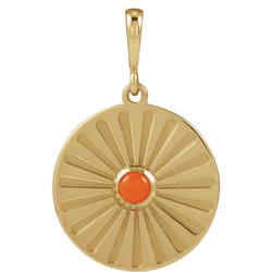 A round coin pendant with a round natural colored gemstone and a starburst ray design. 