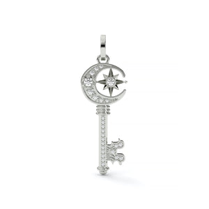 Silver key-shaped pendant with star and moon design on a white background