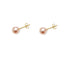 Two light pink pearl stud earrings