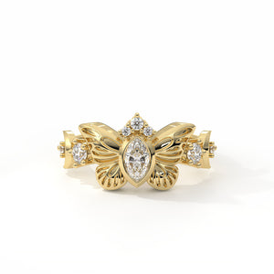 Gold bracelet with diamond accents on a white background