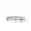 Silver ring with star designs on a white background