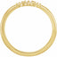 Gold ring with small diamonds on a white background