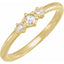 Gold ring with three diamonds on a white background