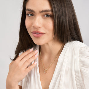 A gold round simple connector lock with a push closure. This connector is made for open loop necklaces or can be used as a clasp. 