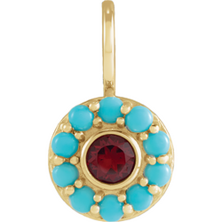 A round pendant with a pink spinel or a red garnet center stone and a turquoise or a opal halo. 