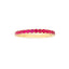 Gold ring with red gemstones on a white background