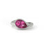 Silver ring with a pink gemstone on a white background
