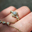 Gold ring with a diamond on a finger