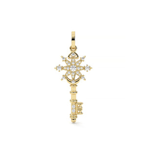 Gold key-shaped pendant with diamond accents on a white background