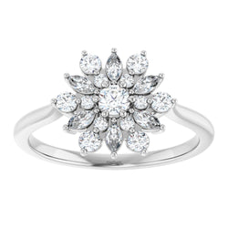 Diamond ring with a floral design on a white background