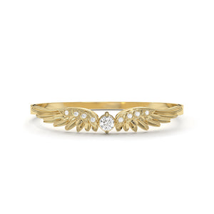 Gold ring with diamond on a white background